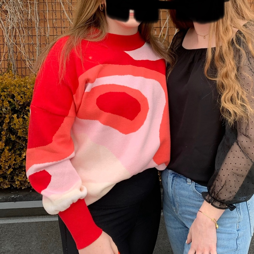 Red and pink abstract sweater